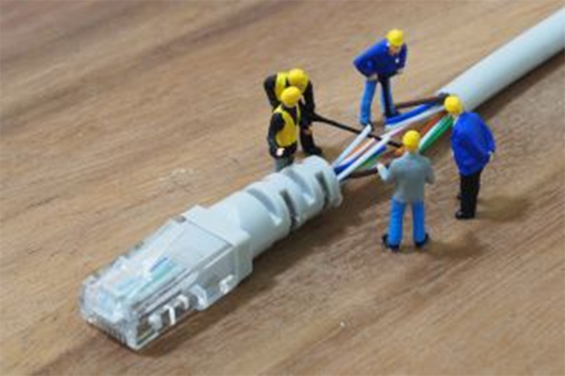 Mini man with internet cables