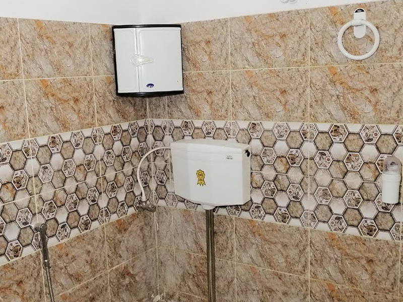 Golden Color Wall Tiles In Bath Room