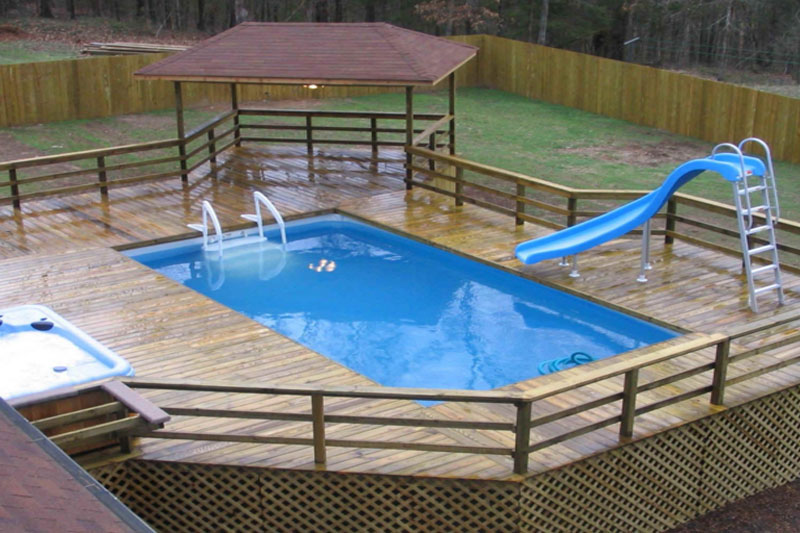 Above ground pool with a slide