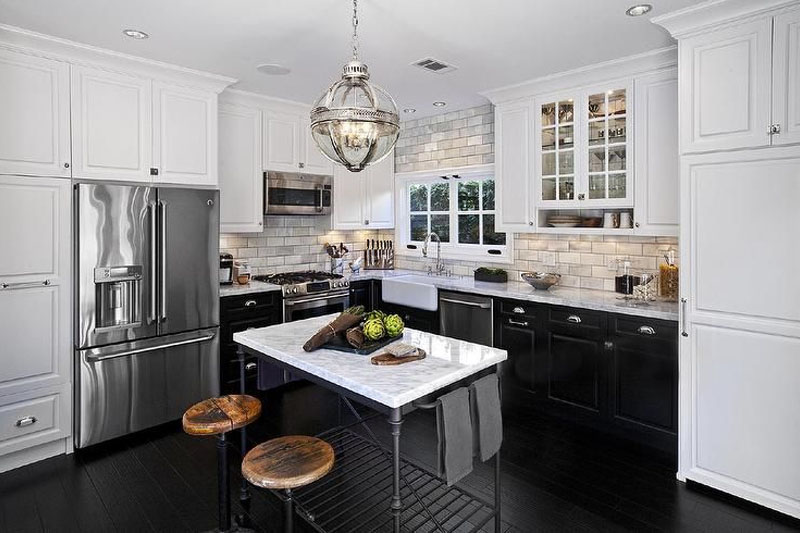 Wood Floor With White Cabinets And Black Hardware